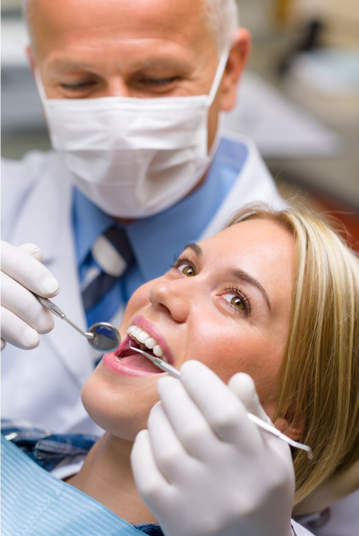 White teeth woman patient at the dentist